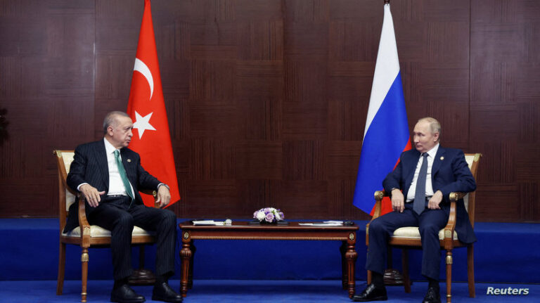 FILE PHOTO: Russia's President Vladimir Putin and Turkey's President Erdogan meet on the sidelines CICA summit in Astana