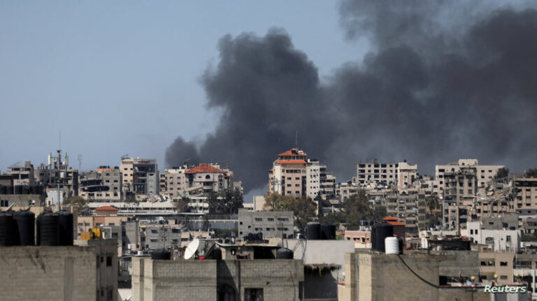Smoke rises during an Israeli raid in Gaza City