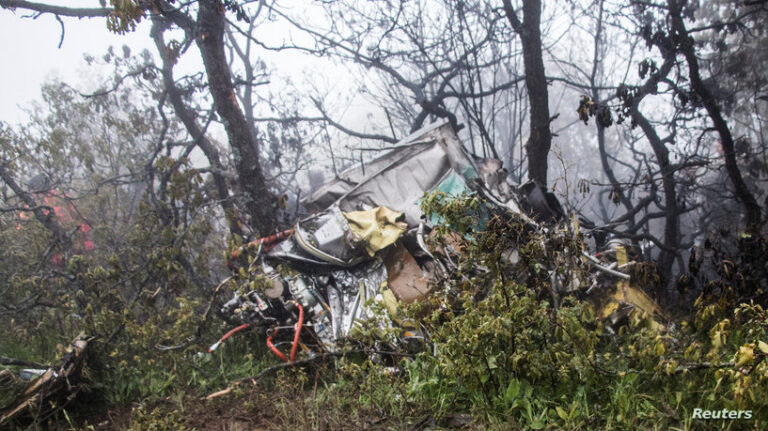 Rescue team works following a crash of a helicopter carrying Iran's President Ebrahim Raisi, in Varzaqan
