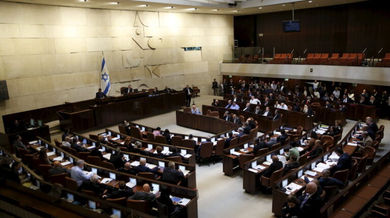 A general view shows the Israeli parliament hall as Herzog delivers his speech during a session for a no-confidence vote at the Israeli Parliament in Jerusalem